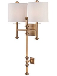 Devon 2-Light Wall Sconce in Warm Brass.